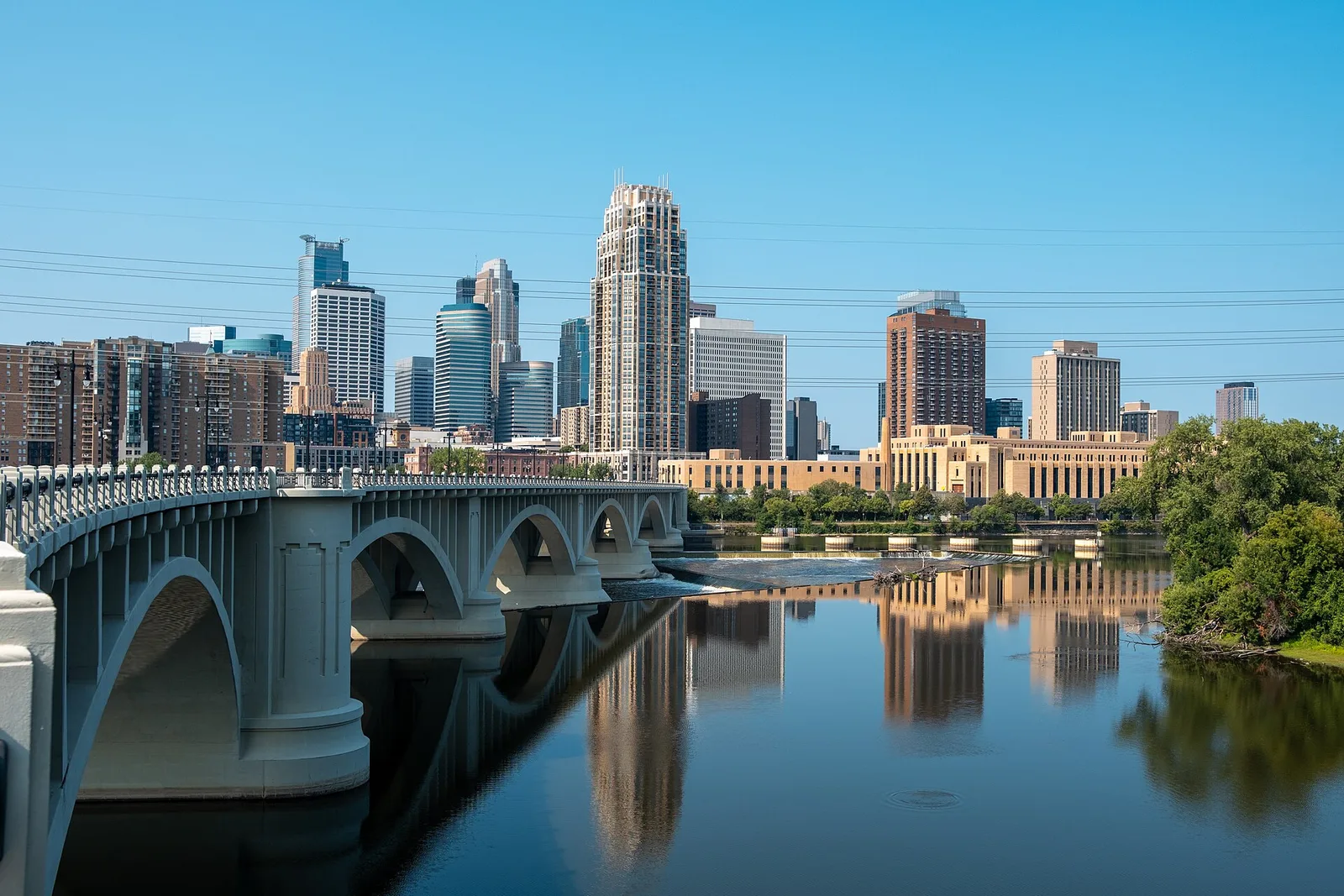 Archival Minneapolis skyline and bridge across the Mississippi River