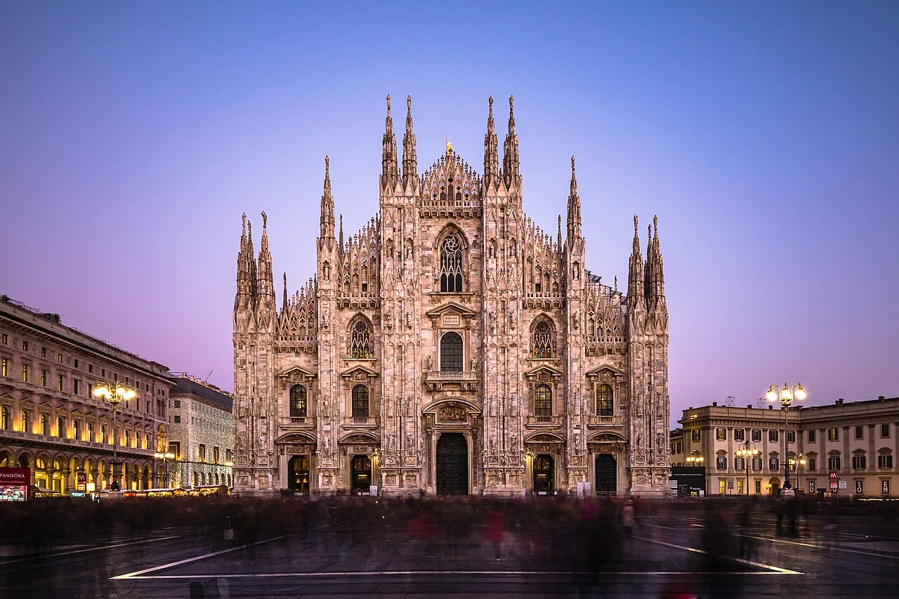 Milan Cathedral and Piazza del Duomo at blue hour, photographed in December 2016; archival city atmosphere