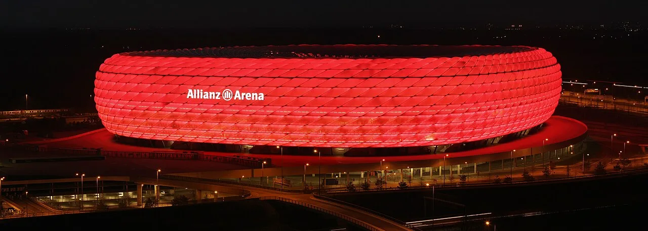 Allianz Arena illuminated red at night, photographed in January 2008